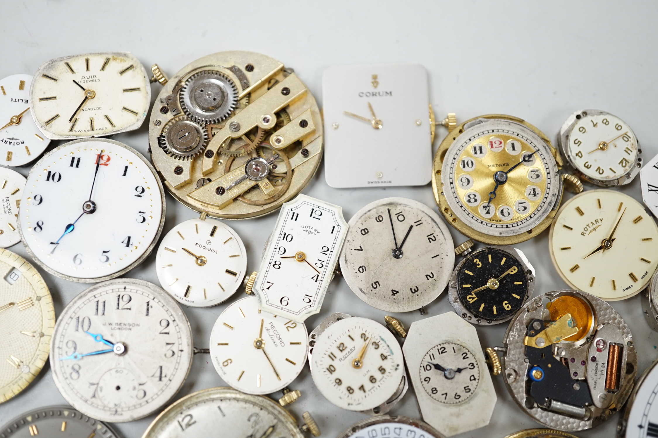 A quantity of assorted wrist and pocket watch parts and movements.